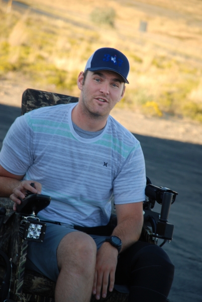 2015 Colton Sasser checking out Action Trackchair donated to Hunting with Heroes by Wyoming VFW