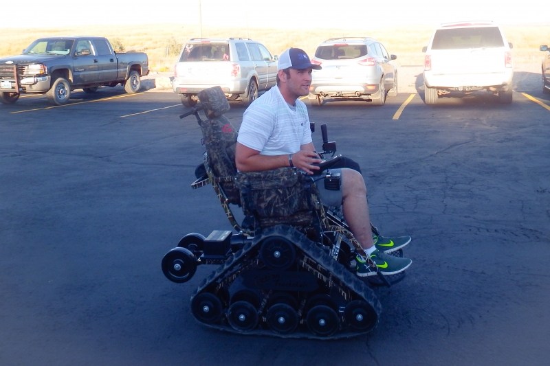 2015 Colton Sasser checking out Action Trackchair donated to Hunting with Heroes by Wyoming VFW