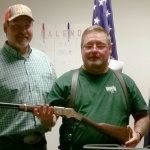 2016 Darin Coyle, Riverton Chapter Chairman, presents Banquet rifle to Michael Higgs