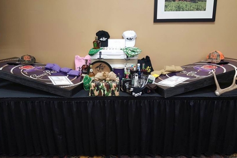 Raffle Package: Crown Corn Hole game, collector bottles of Crown, booze-filled Yeti cooler and more...