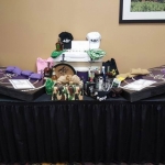 Raffle Package: Crown Corn Hole game, collector bottles of Crown, booze-filled Yeti cooler and more...