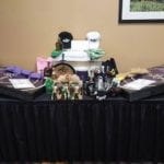 Raffle Package: Crown Corn Hole boards, collector bottles of Crown, booze-filled Yeti cooler and more…